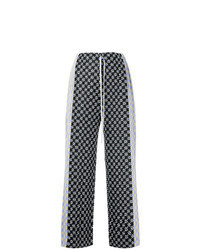 Бело-черные широкие брюки от Pleats Please By Issey Miyake