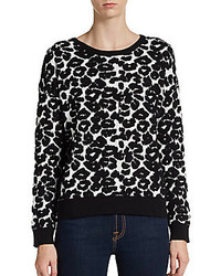 Бело-черный свитер с леопардовым принтом