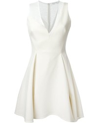 Белое платье с плиссированной юбкой от Victoria Beckham