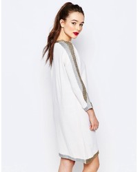 Белое платье-свитер с принтом от Love Moschino