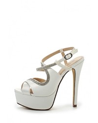 Белые босоножки на каблуке от Tulipano