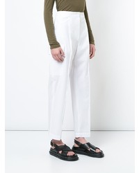 Женские белые брюки карго от Kuho