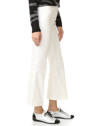 Белые брюки-клеш от Edun