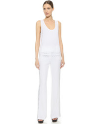 Белые брюки-клеш от Edun