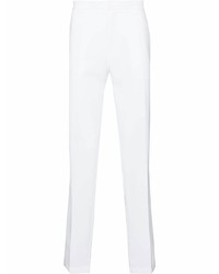 Белые брюки чинос от Lacoste