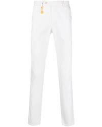 Белые брюки чинос от Manuel Ritz