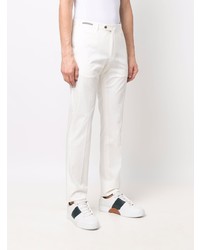 Белые брюки чинос от Corneliani
