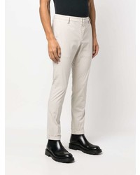 Белые брюки чинос от Dondup