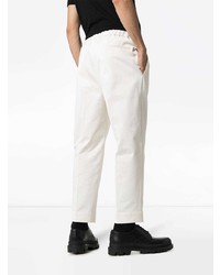 Белые брюки чинос от Jil Sander