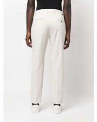 Белые брюки чинос от Haikure