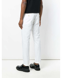 Белые брюки чинос от Prada