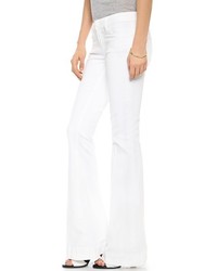 Белые джинсы-клеш от Paige Denim