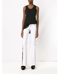 Белые джинсы-клеш от Andrea Bogosian