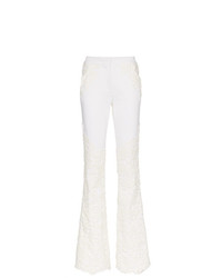 Белые джинсы-клеш от Ronald Van Der Kemp