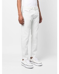 Мужские белые джинсы с вышивкой от Diesel