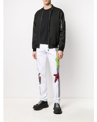 Мужские белые джинсы с вышивкой от Philipp Plein
