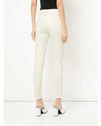 Белые джинсы скинни с украшением от Tu Es Mon Trésor
