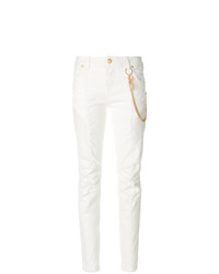 Белые джинсы скинни с украшением от PIERRE BALMAIN