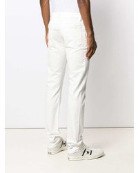 Мужские белые зауженные джинсы от Closed
