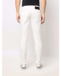 Мужские белые зауженные джинсы от Balmain