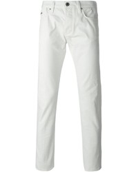 Мужские белые зауженные джинсы от Emporio Armani