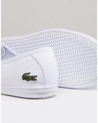 Женские белые кеды из плотной ткани от Lacoste