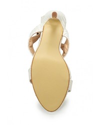 Белые кожаные босоножки на каблуке от Catisa