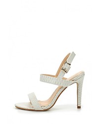 Белые кожаные босоножки на каблуке от Catisa