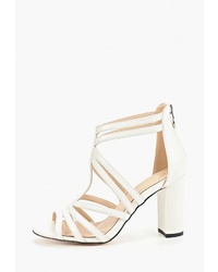 Белые кожаные босоножки на каблуке от Diora.rim