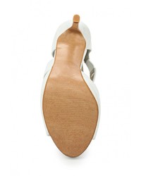 Белые кожаные босоножки на каблуке от Donna Moda