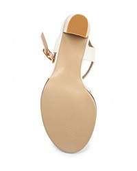 Белые кожаные босоножки на каблуке от Inario