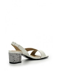 Белые кожаные босоножки на каблуке от Indiana