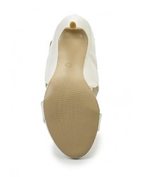 Белые кожаные босоножки на каблуке от Queen Vivi