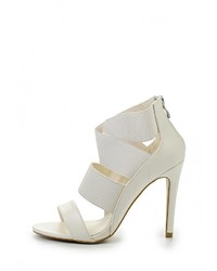 Белые кожаные босоножки на каблуке от Queen Vivi