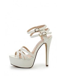 Белые кожаные босоножки на каблуке от Tulipano