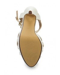 Белые кожаные босоножки на каблуке от Tulipano