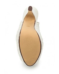 Белые кожаные босоножки на каблуке от Tulipano