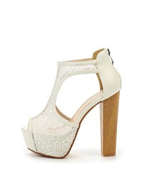 Белые кожаные босоножки на каблуке от Tulipano