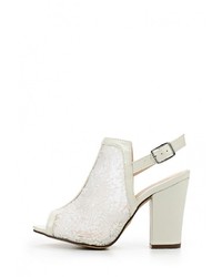 Белые кожаные босоножки на каблуке от Tulipano