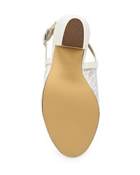 Белые кожаные босоножки на каблуке от Tulipano