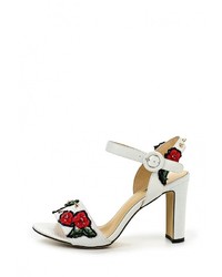 Белые кожаные босоножки на каблуке от Vitacci