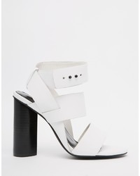 Белые кожаные босоножки на каблуке от Senso