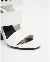 Белые кожаные босоножки на каблуке от Senso