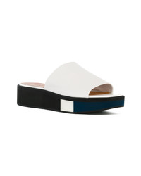 Белые кожаные босоножки на танкетке от Clergerie