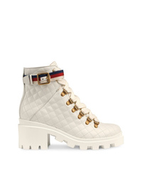 Белые кожаные ботильоны на шнуровке от Gucci