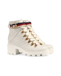 Белые кожаные ботильоны на шнуровке от Gucci