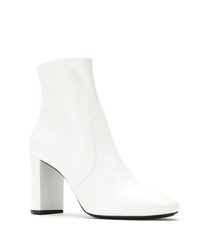 Белые кожаные ботильоны от Prada