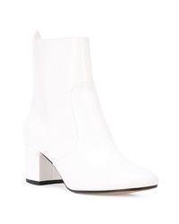 Белые кожаные ботильоны от Coach