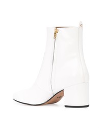 Белые кожаные ботильоны от Coach