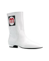 Белые кожаные ботильоны от Miu Miu